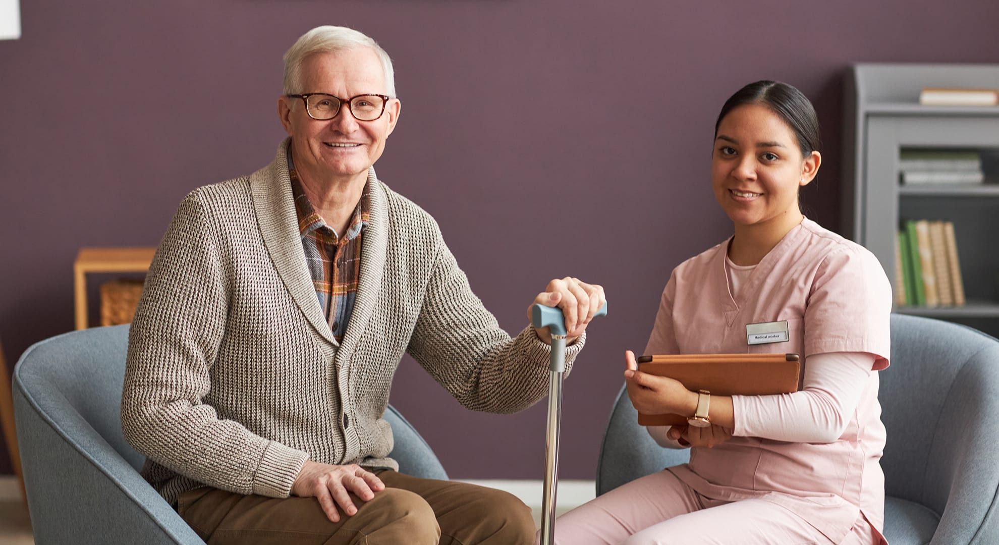 Senior man and caregiver.